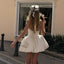 Estella | Vestido Mini con Cuello Halter y Espalda Descubierta